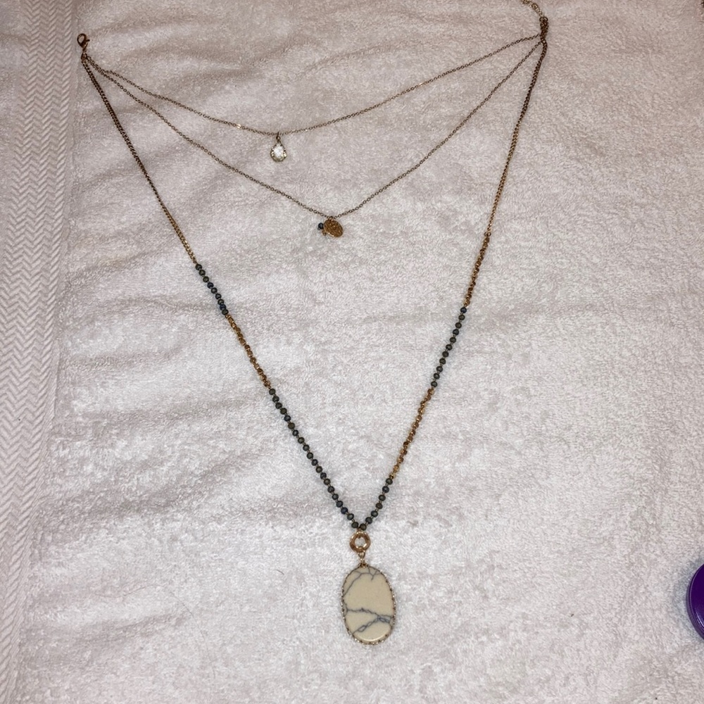 Layered necklace.